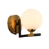 Wall luminaire in Matt Black and Antique Brass LL00012